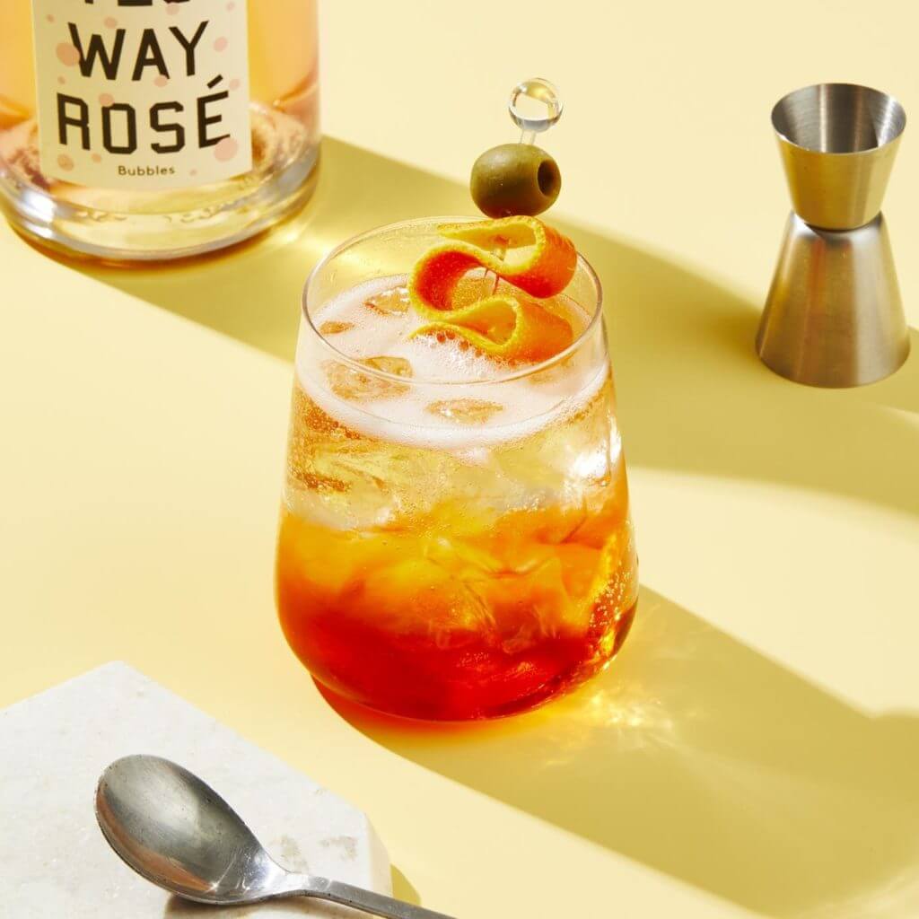 yes-way-spritz drink and a yes way rose bottle