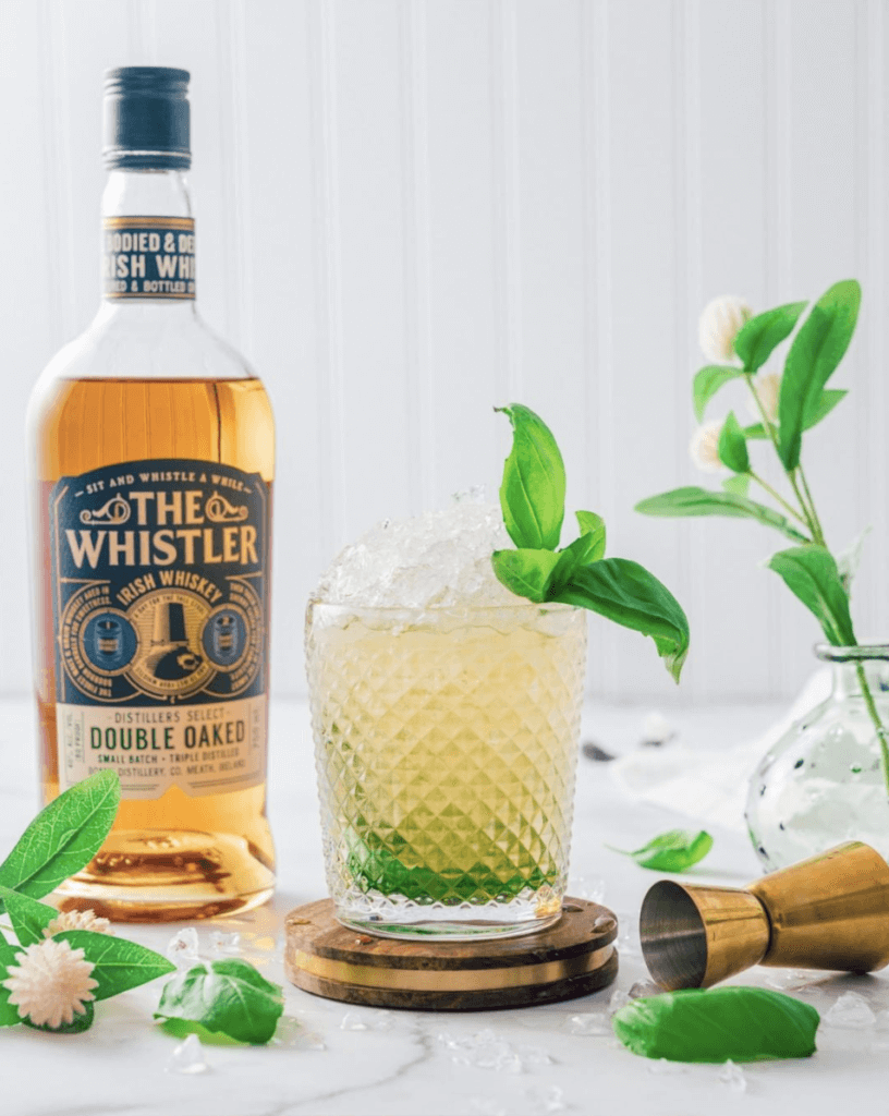basil-julep drink and the whistler bottle -Double Oaked