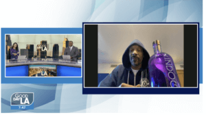 Snoop Live on Good Day LA with an indoggo gin bottle
