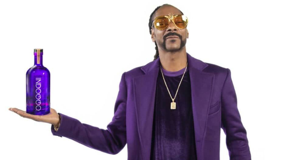 Snoop holding an Indoggo Gin Bottle