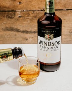 windsor canadian whisky pouring in a glass